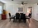 Bright dining room with modern furnishings, neutral color scheme, and updated flooring at 655 Katherine Ave, Orlando, FL 32810
