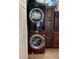 A laundry room features stacked washer and dryer units for saving space at 655 Katherine Ave, Orlando, FL 32810