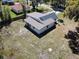 Aerial view of a single-story home with a modern roof design, surrounded by a spacious yard at 709 S Parsons Ave, Deland, FL 32720