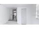 Finished basement area with light walls, new flooring, and an open floor plan at 709 S Parsons Ave, Deland, FL 32720