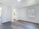 Bright bedroom showcasing modern flooring and an ensuite bathroom at 709 S Parsons Ave, Deland, FL 32720