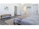 Bedroom featuring gray floors, two white doors, and artwork that creates a relaxing retreat at 709 S Parsons Ave, Deland, FL 32720