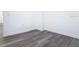 Bedroom featuring neutral walls, wood-look flooring, and modern trim at 709 S Parsons Ave, Deland, FL 32720