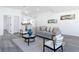 Bright, open living room with modern decor and stylish furniture at 709 S Parsons Ave, Deland, FL 32720