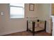 Cozy bedroom featuring a window and a Graco Pack 'n Play at 7609 Brookhurst Ln, Kissimmee, FL 34747