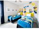 Playful bedroom with Minion-themed decor, twin beds, and colorful accents for a fun atmosphere at 7719 Graben St, Kissimmee, FL 34747