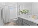 Clean bathroom with neutral color palette, tub-shower combo, and modern vanity at 8025 Topsail Pl, Winter Garden, FL 34787