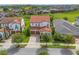 Beautiful home exterior with a tile roof, well-manicured lawn, and a welcoming three-car garage at 8025 Topsail Pl, Winter Garden, FL 34787