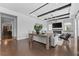 Inviting living room boasts a fireplace, modern lighting, and neutral tones at 8025 Topsail Pl, Winter Garden, FL 34787