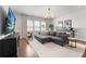Comfortable living room with modern decor, natural light, and a relaxing atmosphere at 8025 Topsail Pl, Winter Garden, FL 34787