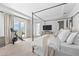 Spacious main bedroom with four-poster bed, access to private balcony, and in-room exercise equipment at 8025 Topsail Pl, Winter Garden, FL 34787