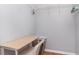 Walk-in closet with an office desk area, with overhead shelving, and chair for a convenient work space at 8711 Rockingham Ter # A, Kissimmee, FL 34747