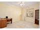 Bedroom featuring tiled floors, a ceiling fan, and natural light from the window at 9102 Shadowbrook Trl, Orlando, FL 32825