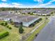 Aerial view of a community with well-maintained lawns and lovely landscaping at 937 Avery Meadows Way, Deland, FL 32724
