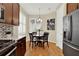 Cozy breakfast nook with a round table, comfortable seating, and natural light from the window at 937 Avery Meadows Way, Deland, FL 32724
