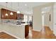 Modern kitchen with stainless steel appliances, granite countertops, and a stylish backsplash at 937 Avery Meadows Way, Deland, FL 32724