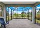 Screened in patio with brick flooring that is perfect for outdoor dining at 937 Avery Meadows Way, Deland, FL 32724