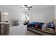 Charming bedroom with playful decor and plenty of natural light and a ceiling fan at 965 Talon Pl, Winter Springs, FL 32708