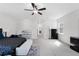 Bright main bedroom featuring neutral walls, a ceiling fan and a long corridor at 965 Talon Pl, Winter Springs, FL 32708