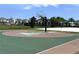 Community basketball court and sand volleyball court for outdoor fun and activities at 9787 Introduction Way, Orlando, FL 32832