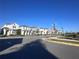 Street view of residential neighborhood with sidewalks and well-maintained lawns at 9787 Introduction Way, Orlando, FL 32832