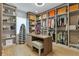 Spacious walk-in closet has custom shelving and storage, offering organization for clothes, shoes, and accessories at 10032 Brocksport Cir, Gotha, FL 34734