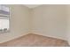 Cozy bedroom with neutral carpet, window with blinds, and neutral-painted walls at 1187 Tadsworth Ter, Lake Mary, FL 32746