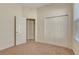 Neutral bedroom featuring a closet and an additional door leading to an adjacent room at 1187 Tadsworth Ter, Lake Mary, FL 32746