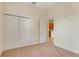 Bedroom featuring double closets and access to the kitchen at 1187 Tadsworth Ter, Lake Mary, FL 32746