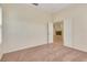 Bedroom with neutral paint and carpet; doorway to main living area at 1187 Tadsworth Ter, Lake Mary, FL 32746