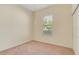 Cozy bedroom with carpet, a window, and a closet at 1187 Tadsworth Ter, Lake Mary, FL 32746