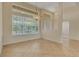 The dining room has large windows and tile flooring at 1187 Tadsworth Ter, Lake Mary, FL 32746