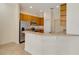 Bright kitchen features stainless appliances, granite countertops, and ample cabinet space at 1187 Tadsworth Ter, Lake Mary, FL 32746