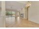 Open living room features tile floors and a cozy fireplace at 1187 Tadsworth Ter, Lake Mary, FL 32746
