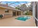View of the pool with screened enclosure connected to the home's back patio at 1187 Tadsworth Ter, Lake Mary, FL 32746