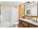 Cozy bathroom featuring a vanity with granite countertop and bathtub with shower at 12527 Floridays Resort Dr # E-111, Orlando, FL 32821