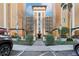 Stately condo exterior with manicured landscaping and designated accessible parking spaces at 12527 Floridays Resort Dr # E-111, Orlando, FL 32821