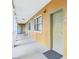 Inviting condo hallway with neutral tones and well-lit entrances at 12527 Floridays Resort Dr # E-111, Orlando, FL 32821