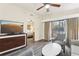 Relaxing living room with a balcony view and seamless transition to the bedroom at 12527 Floridays Resort Dr # E-111, Orlando, FL 32821