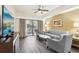 Bright condo living room with scenic views, featuring a cozy seating area at 12527 Floridays Resort Dr # E-111, Orlando, FL 32821
