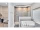 Elegant bathroom features a soaking tub with a separate tiled shower, and neutral color palette at 13059 Stoddart Ave, Orlando, FL 32827