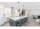 Spacious modern kitchen features a large island with bar stool seating at 13059 Stoddart Ave, Orlando, FL 32827