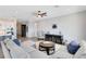 Open concept living area featuring modern furnishings and stylish decor at 13059 Stoddart Ave, Orlando, FL 32827