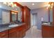 Lavish bathroom with granite countertops, dual sinks, ample cabinet storage, and tile flooring at 1322 Ensenada Dr, Orlando, FL 32825