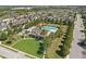 Community clubhouse with a pool, playground, and lush landscaping, creating a resort-like feel at 1325 Seburn Rd, Apopka, FL 32703