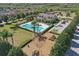 Aerial view of community featuring pool, clubhouse, and playground in a Gathering-friendly setting at 1325 Seburn Rd, Apopka, FL 32703