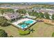 Aerial view of community pool, clubhouse, and playground, showcasing amenities and Gathering-friendly environment at 1325 Seburn Rd, Apopka, FL 32703