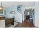 Light-filled dining room with stylish chandelier and dark wood flooring at 1325 Seburn Rd, Apopka, FL 32703