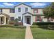 Charming two-story townhouse with well-manicured lawn and inviting entryway at 1325 Seburn Rd, Apopka, FL 32703