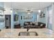 Open-concept living room showcases stylish decor, comfortable seating, and a view from the kitchen at 1325 Seburn Rd, Apopka, FL 32703